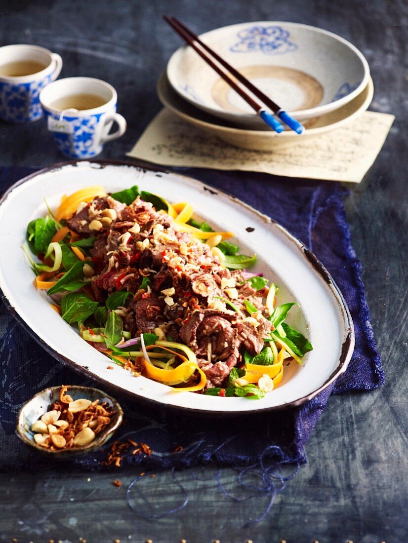 Salad with marinated beef and peanuts