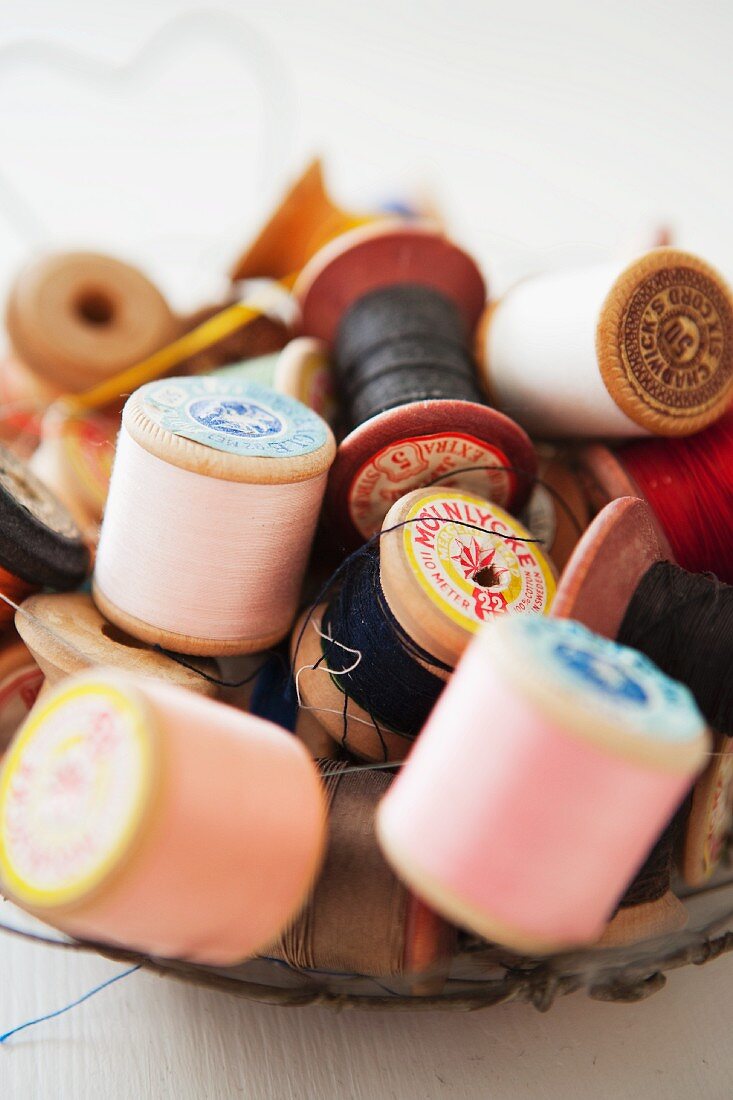 Old wooden reels of thread