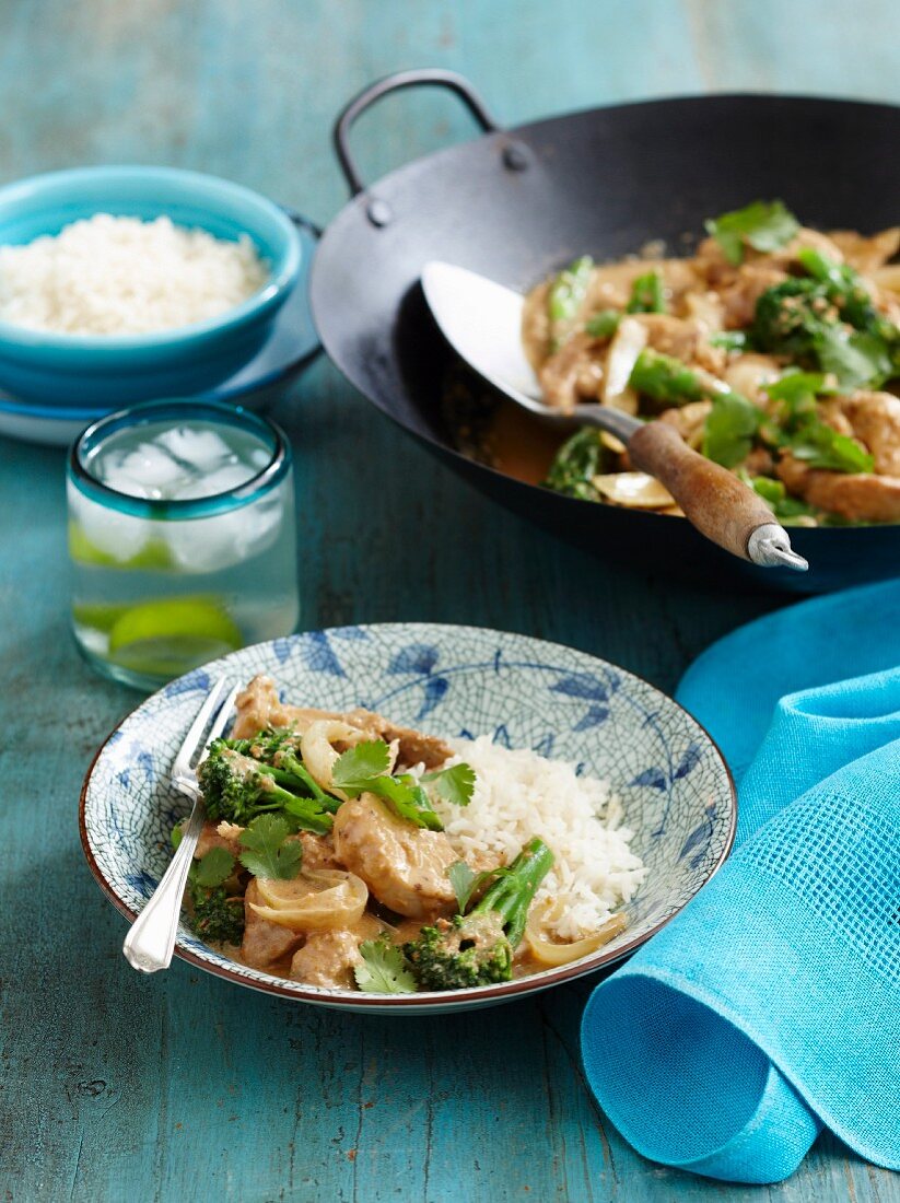Satay chicken with broccoli and rice