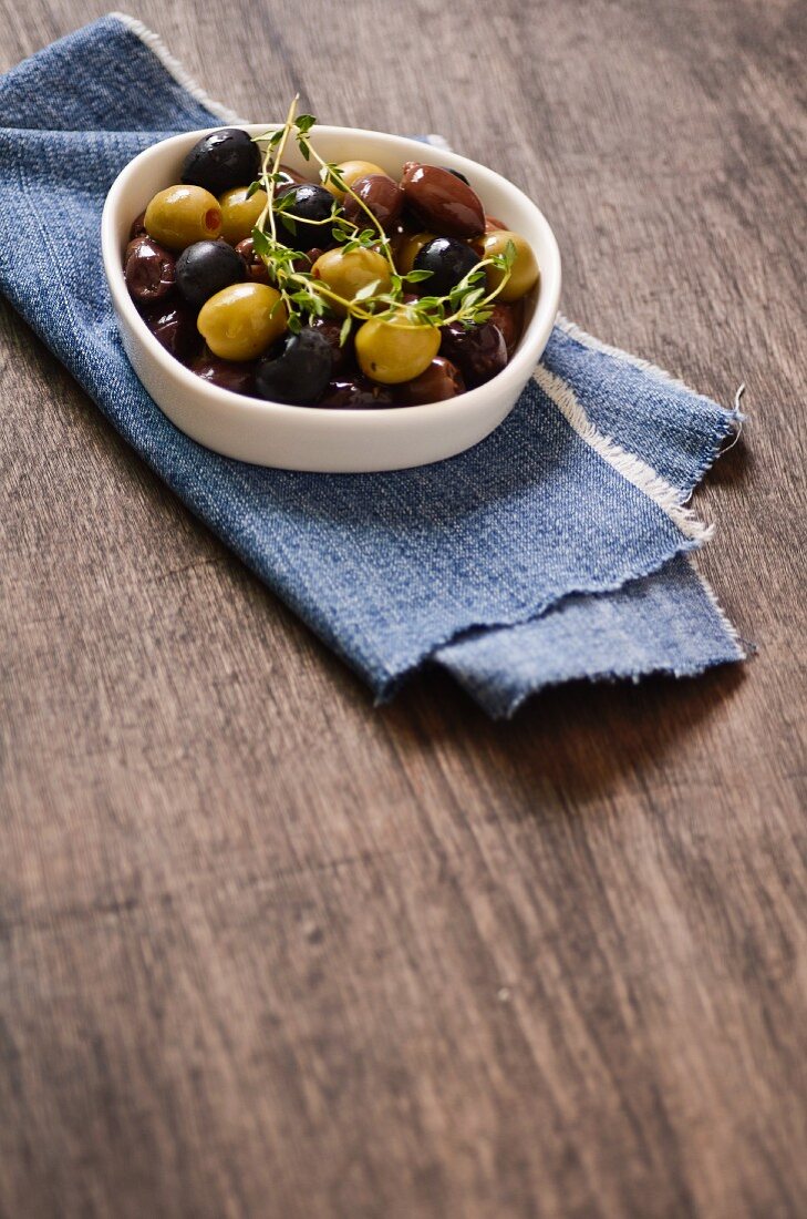 A bowl of various olives