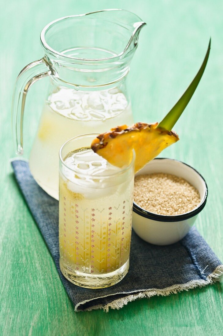 A pineapple drink and cane sugar