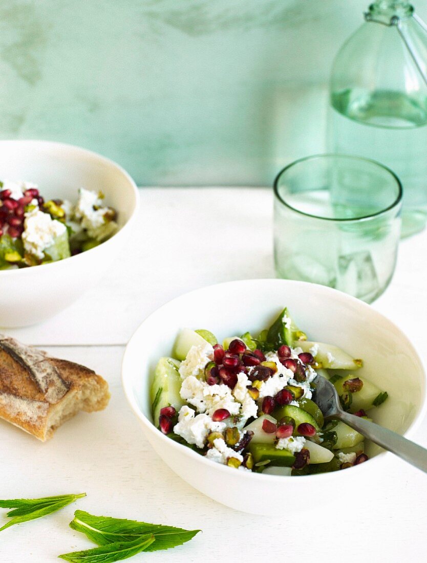 Cucumber salad with feta, pistachios and pomegranate seeds