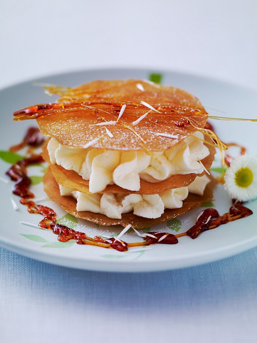 Mille feuilles with cream, caramel and daisies