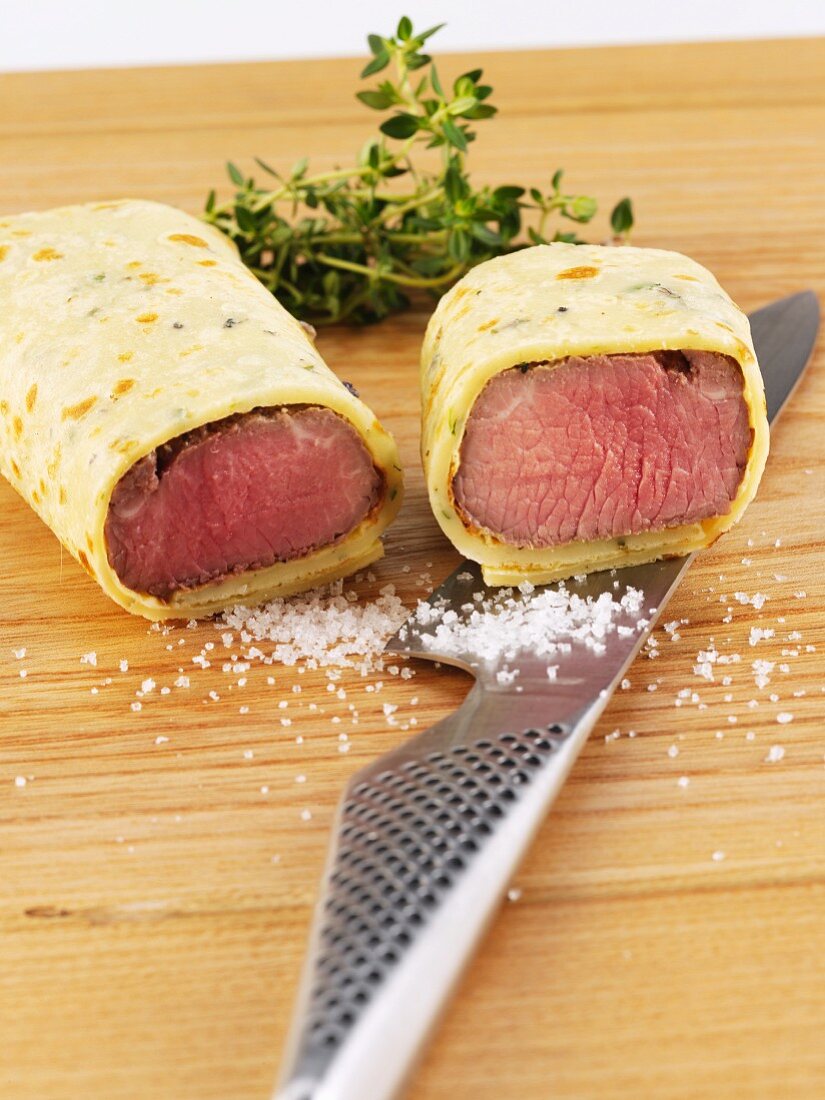 Poached lamb fillets wrapped in pancake