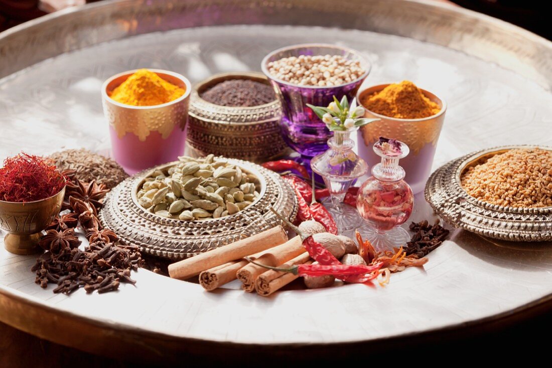 Various Indian spices on a tray