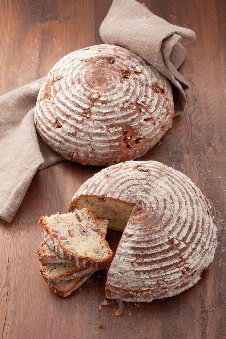 Loaves of bread with pumpkin seeds and pomegranate
