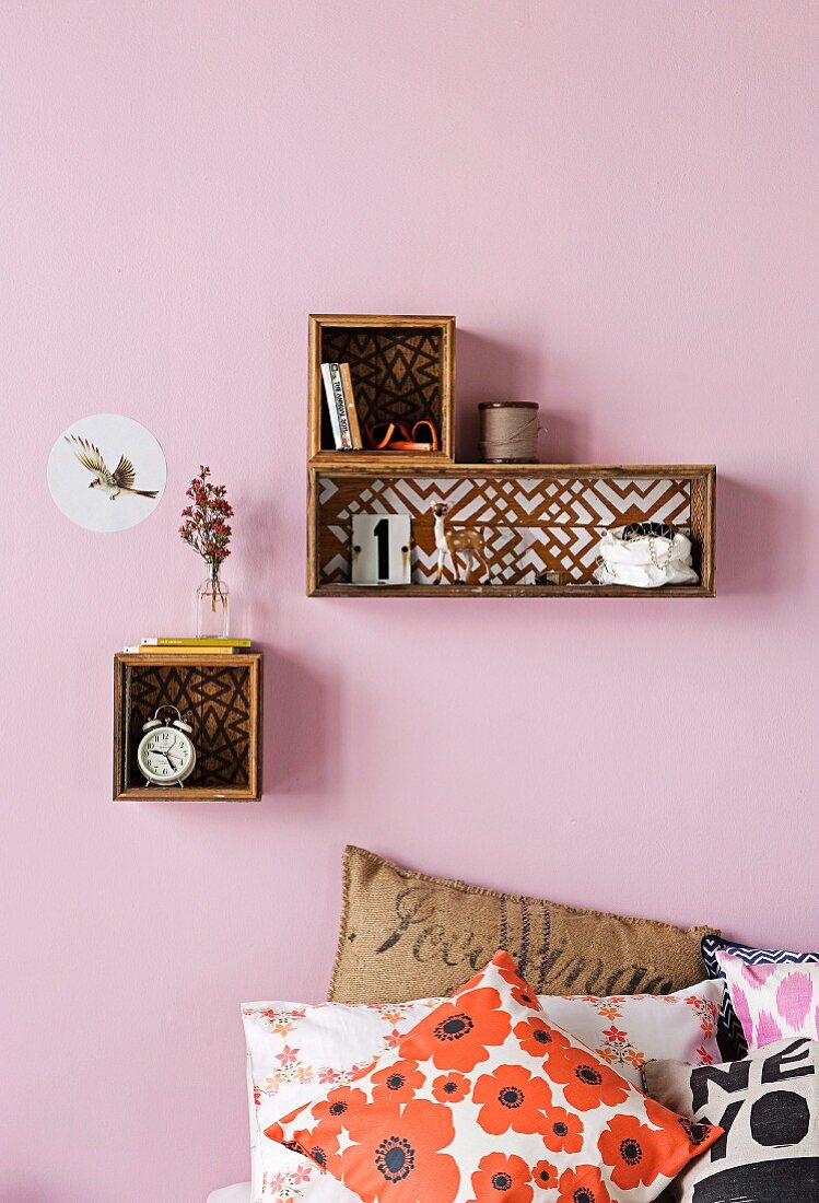 Box shelves with patterned back walls can be hand-crafted using wallpaper offcuts or painted