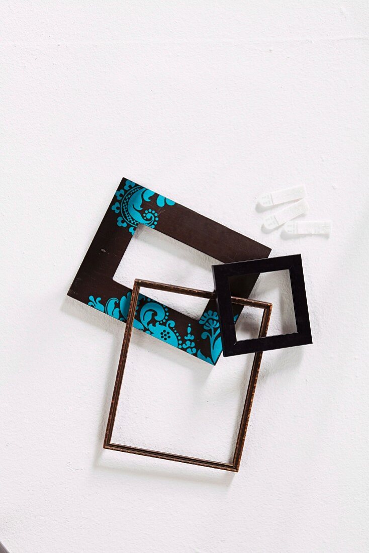 Empty picture frames and sticky strips