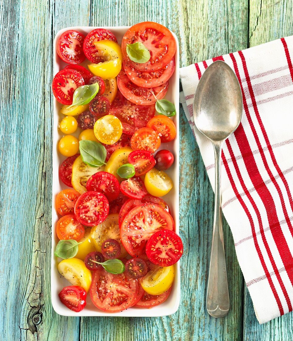Sliced Heirloom Tomato Salad on a Serving Dish; From Above