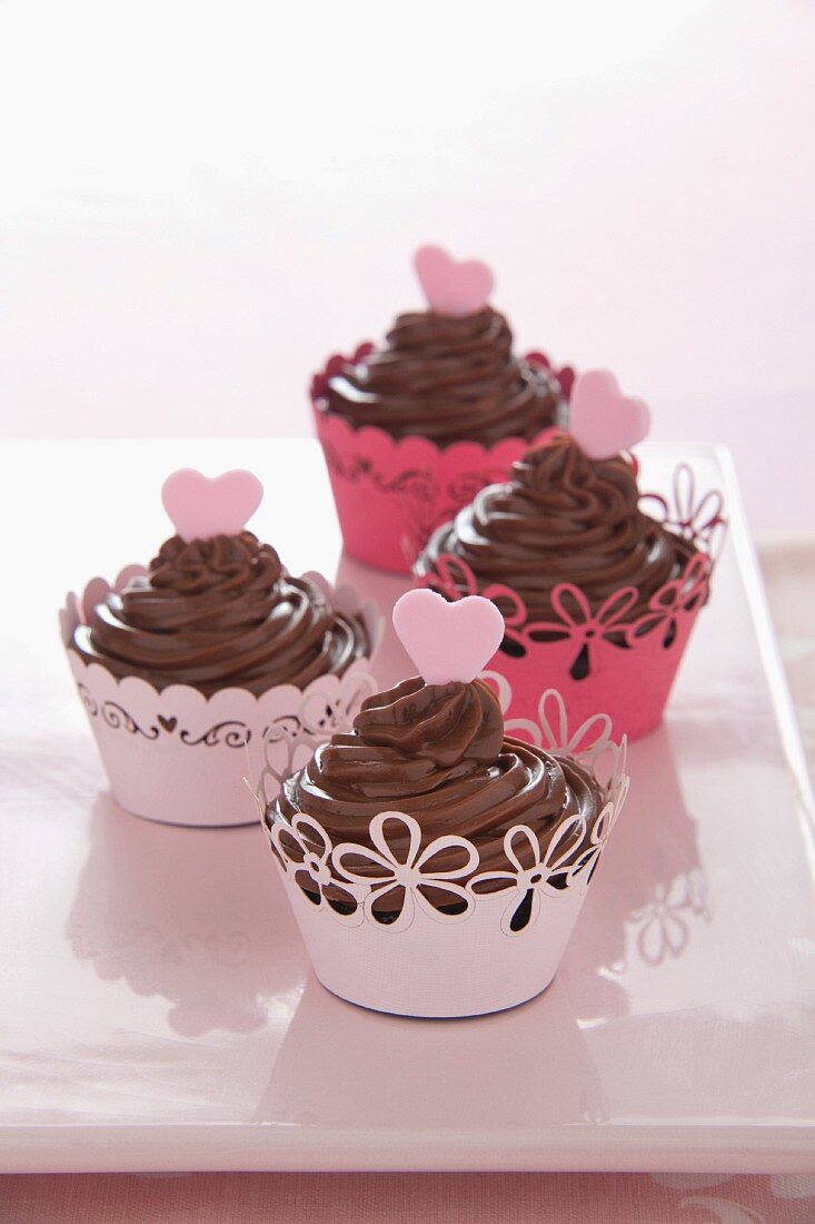 Chocolate cupcakes with pink hearts
