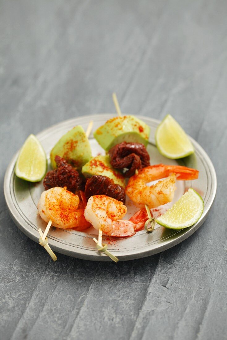 Prawn skewers with avocado and dried tomatoes
