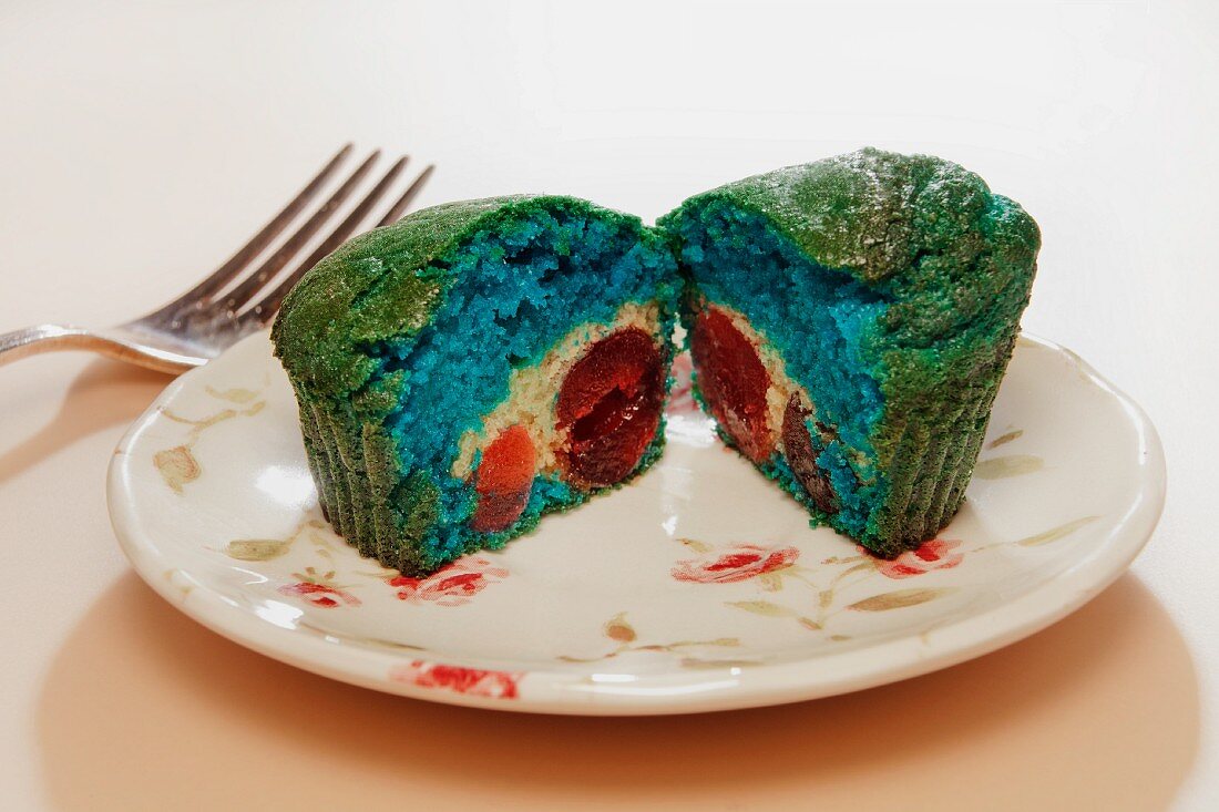 A colourful muffin with a fruit filling