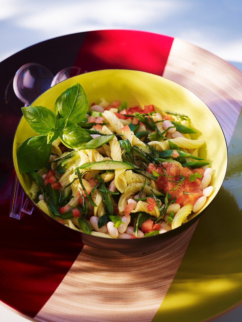 Pasta salad with beans, courgette and tomatoes
