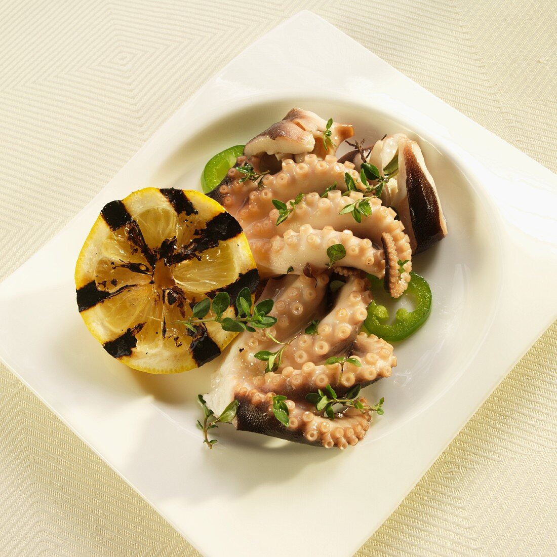 Greek Marinated Octopus with Herbs and Grilled Lemon