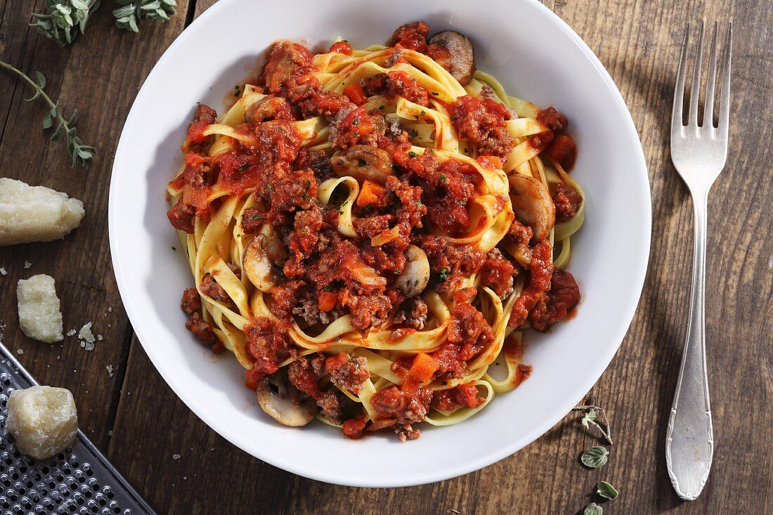 Tagliatelle with bolognese sauce and mushrooms