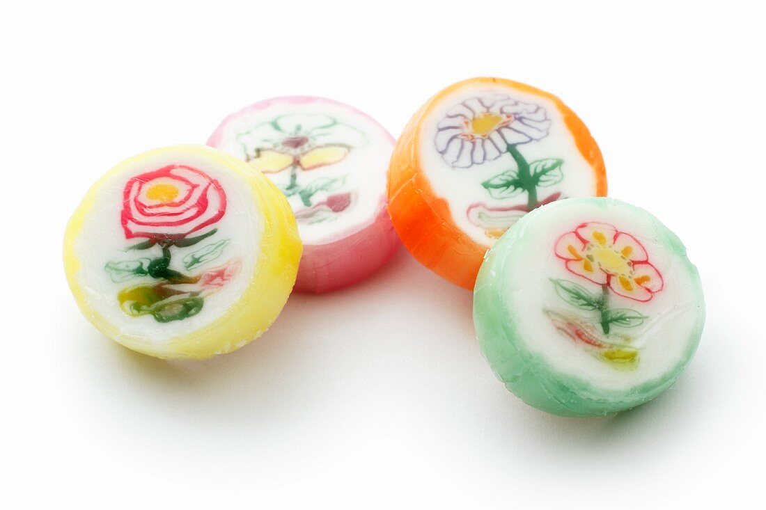 Four sweets with a flower design