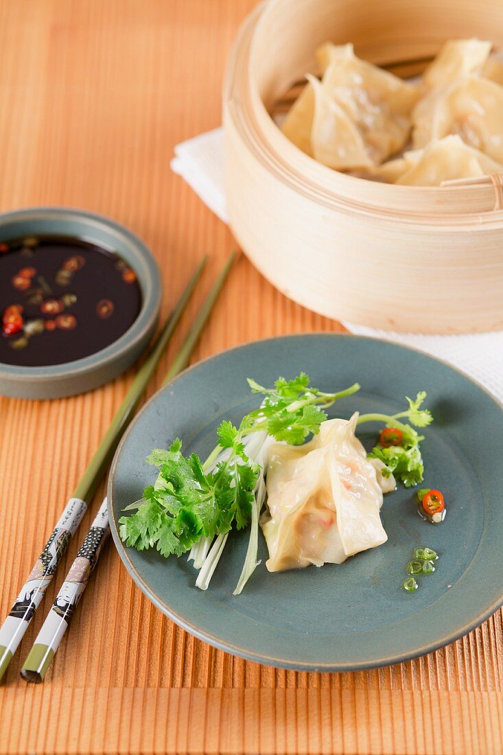 Dim sum with soy and chilli sauce