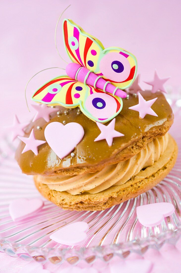 Whoopie pie with coffee glaze, a butterfly, hearts and stars