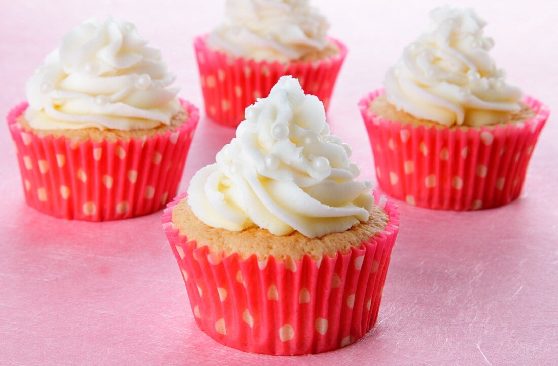 Cupcakes with buttercream and white sugar pearls