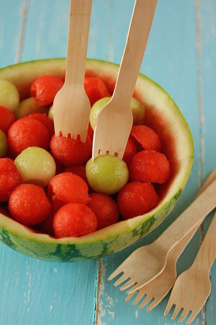 Assorted melon balls in a hollowed-out watermelon