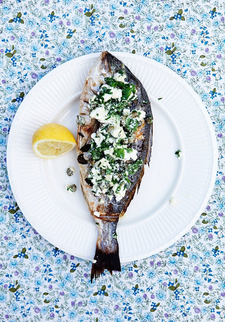 Roasted sea bass with feta and herbs
