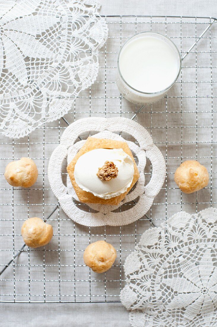 Profiteroles with ice cream and milk