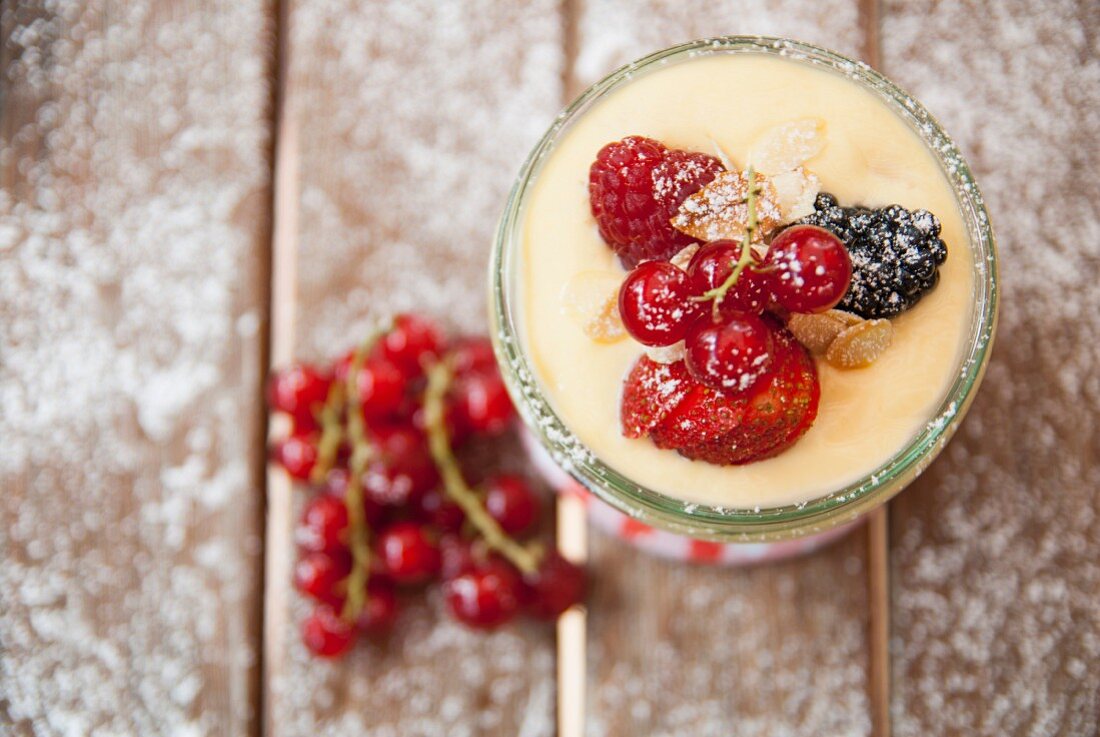 Vanilla custard dessert with fresh berries