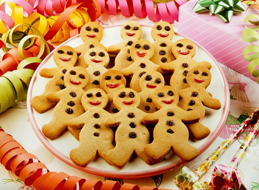Lots of gingerbread men on a plate for a party