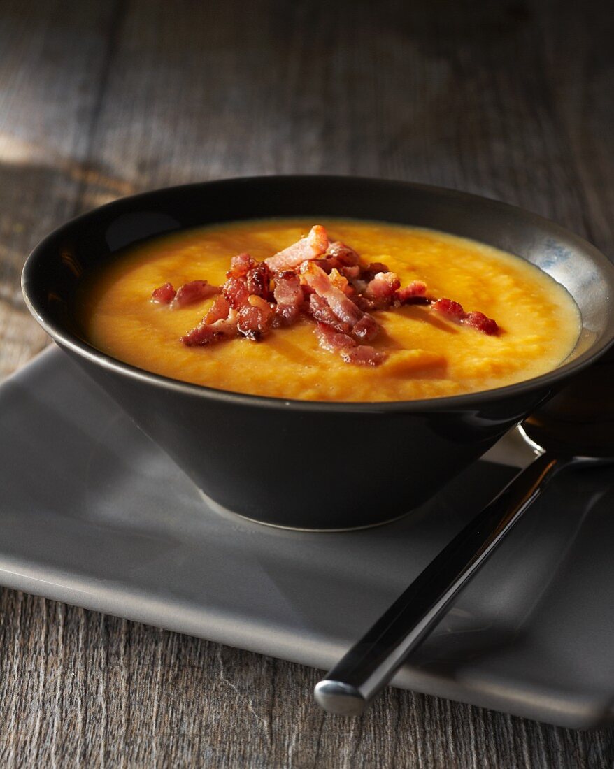 Pumpkin soup topped with bacon