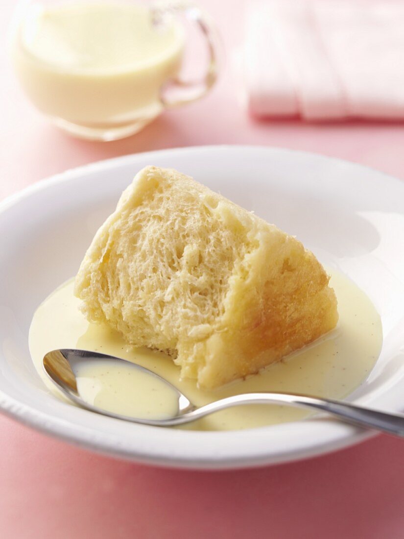 Dumpling cake (Dampfnudel) with vanilla sauce