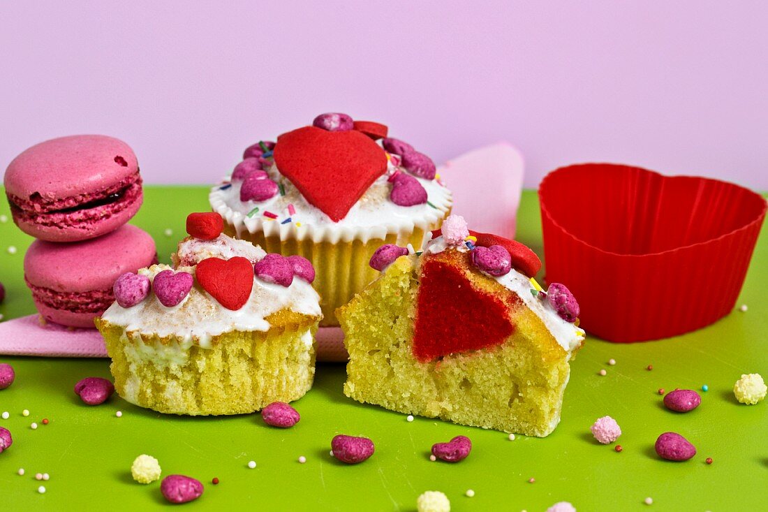 Heart-shaped cupcakes and strawberry macaroons