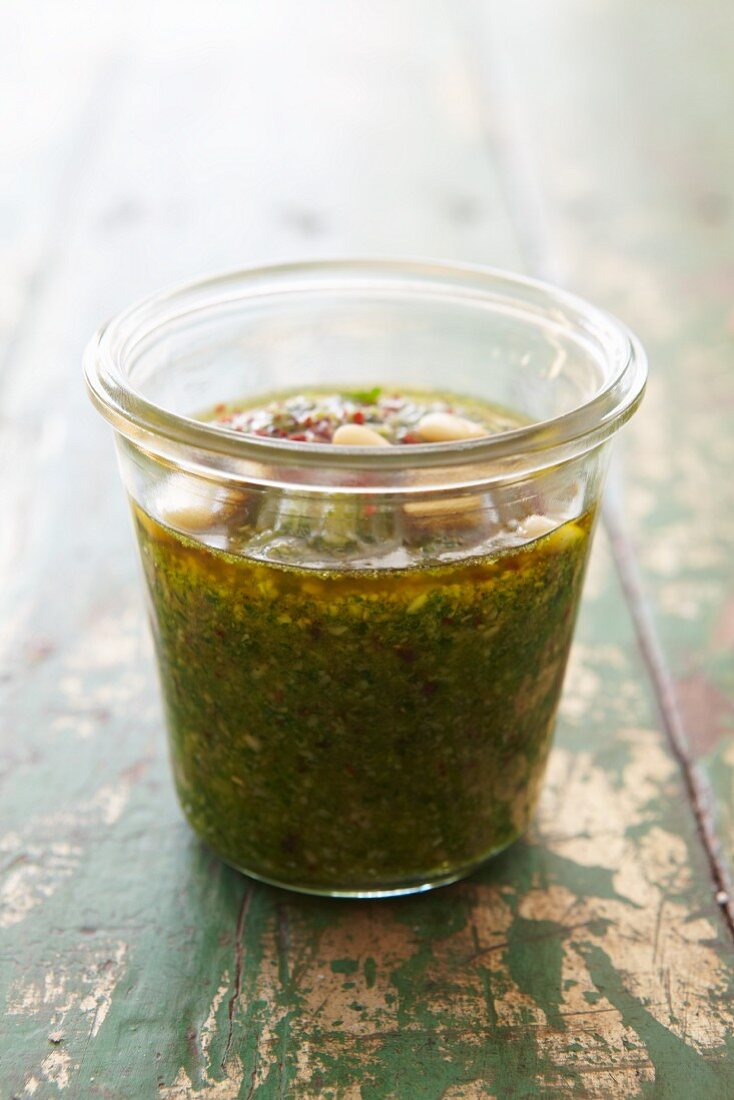 Basil pesto with pine nuts in a glass
