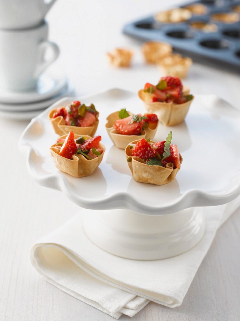 Mini pastry cases filled with strawberries
