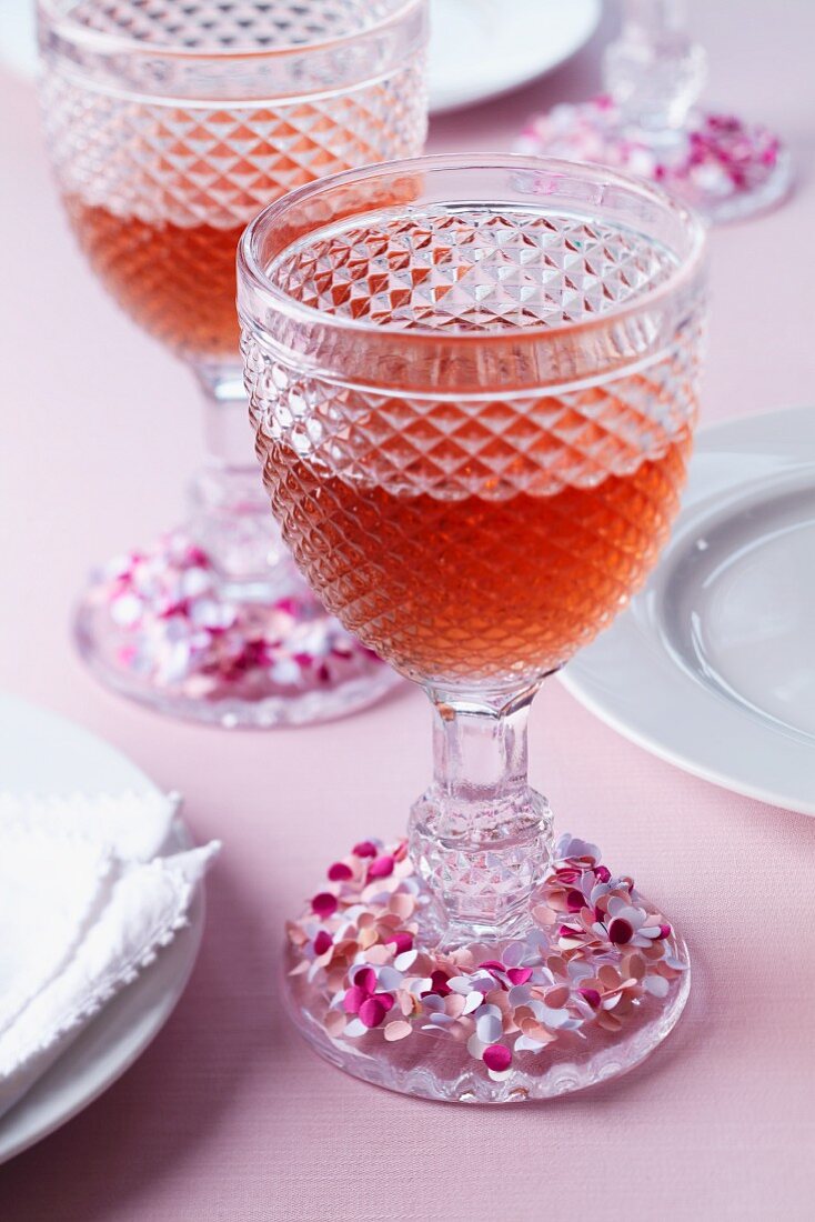 Wine glasses decorated with home-made confetti