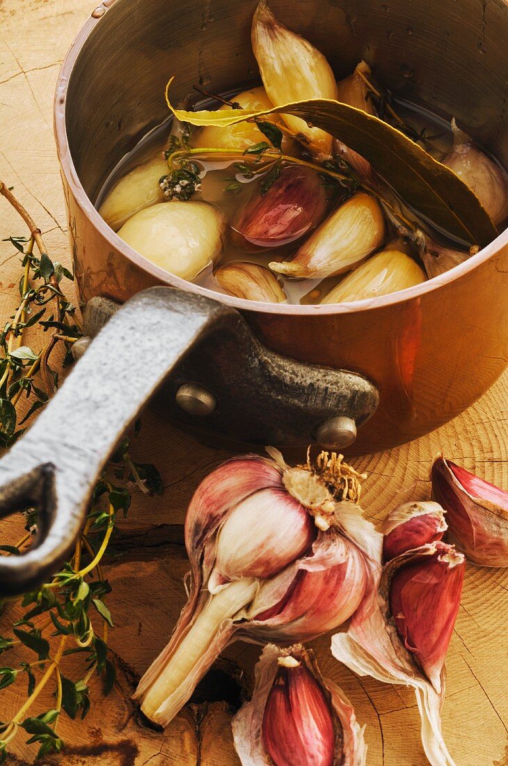 Garlic confit with bay leaf and thyme