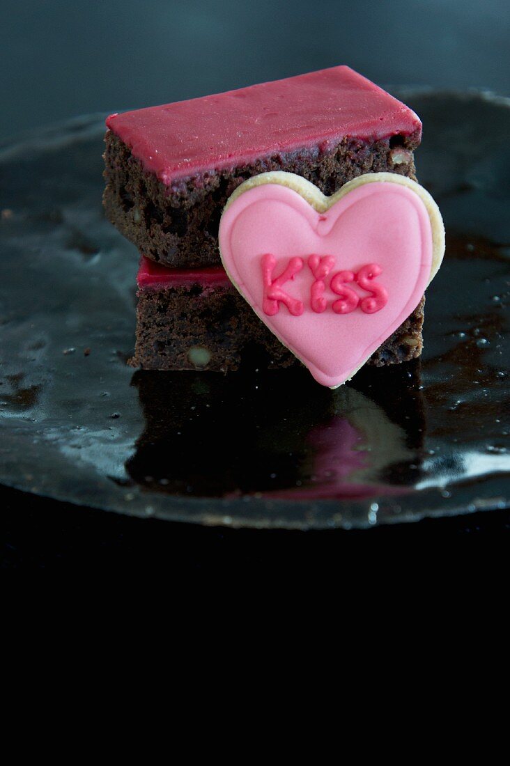 Brownies with a heart-shaped biscuit