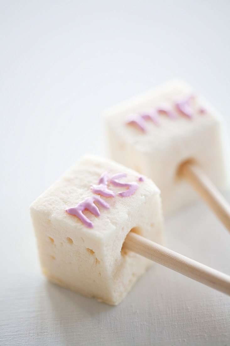 Marshmallows decorated with writing