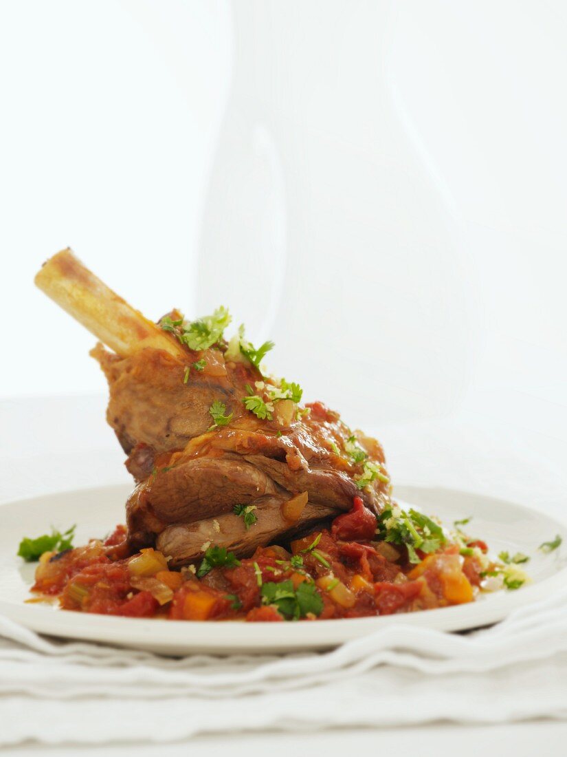 Lamb shank with tomatoes and coriander