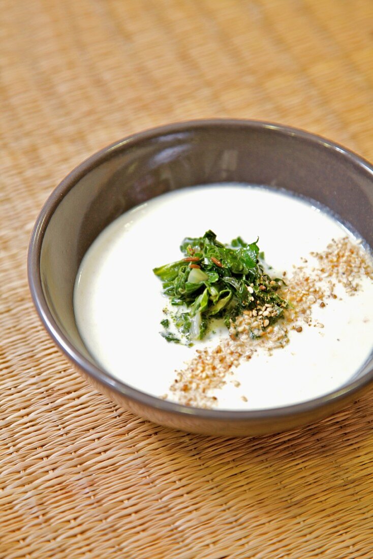 Oat milk soup with chard and sesame seeds