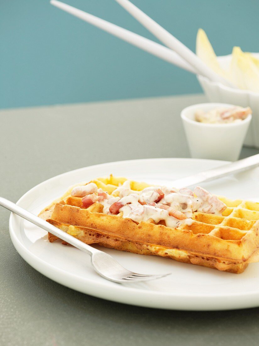 Cheese waffles with carbonara sauce