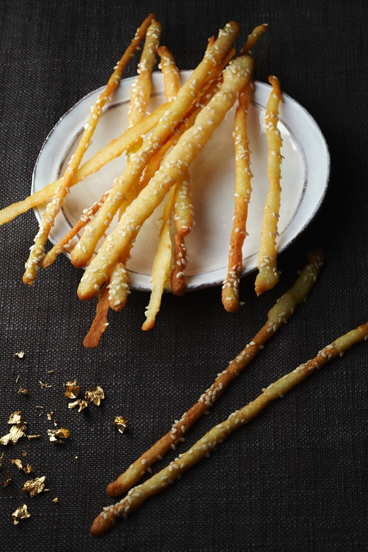 Crispy cheese sticks with sesame seeds