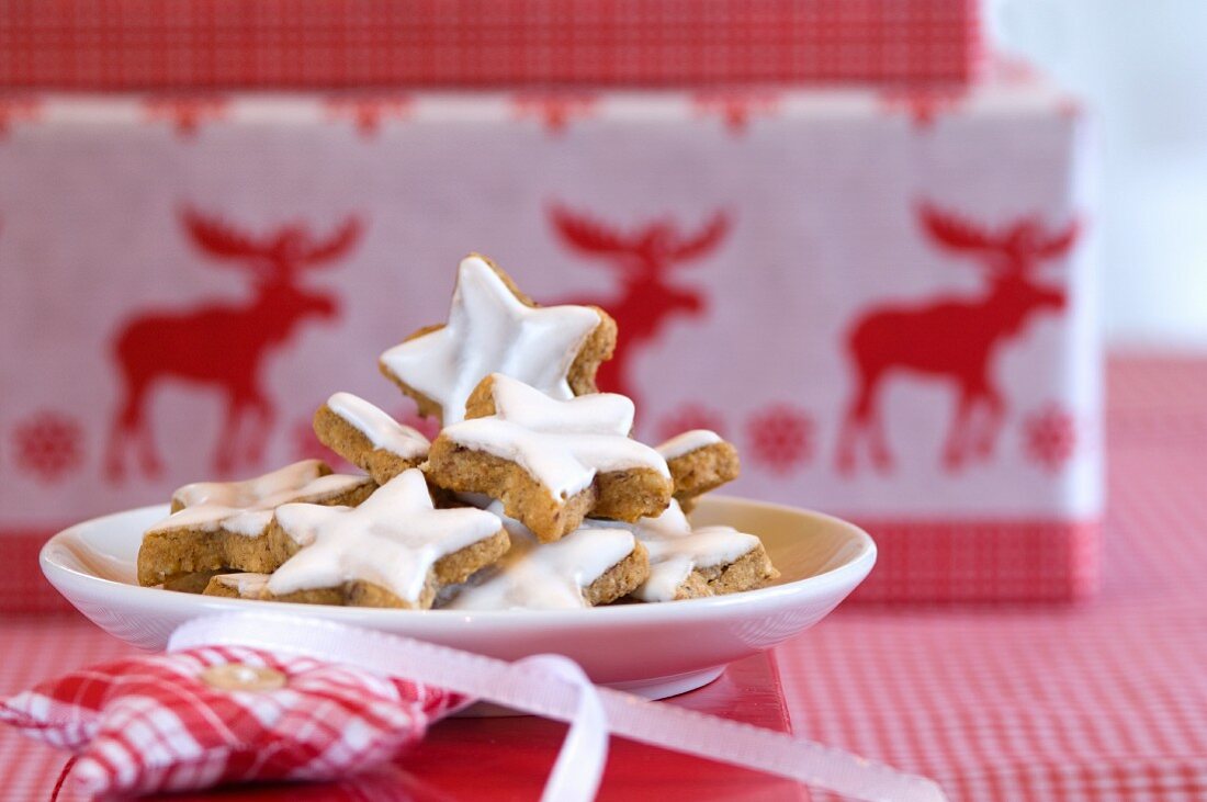 A plate of star-shaped cinnamon biscuits