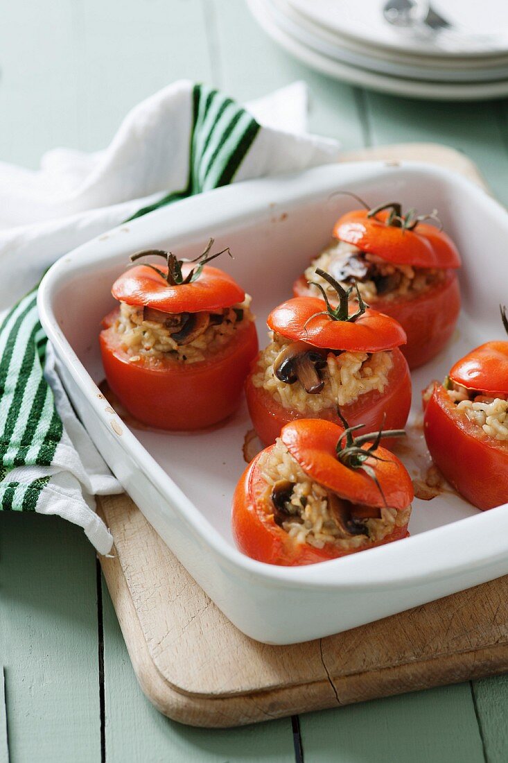 Tomatoes stuffed with mushroom risotto