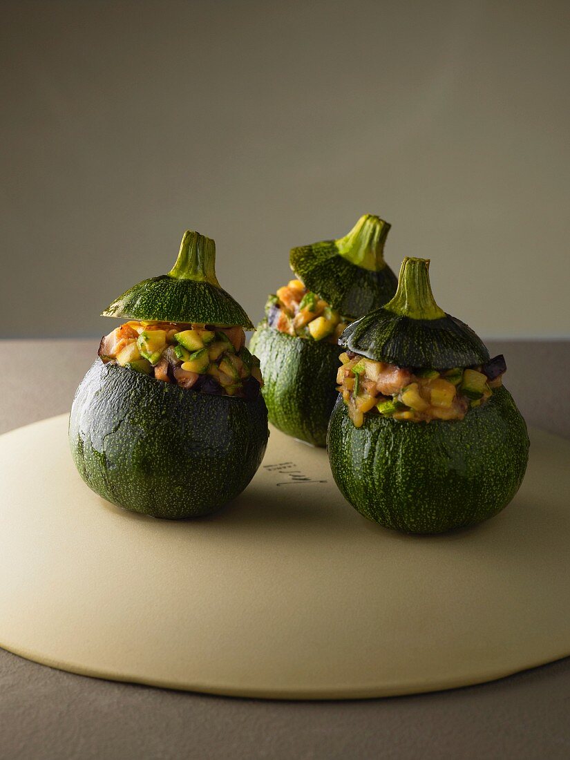 Round courgettes stuffed with shiitake mushrooms