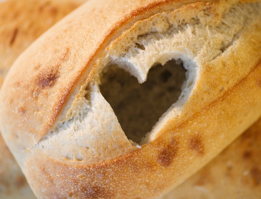 Heart cutout in loaf of bread