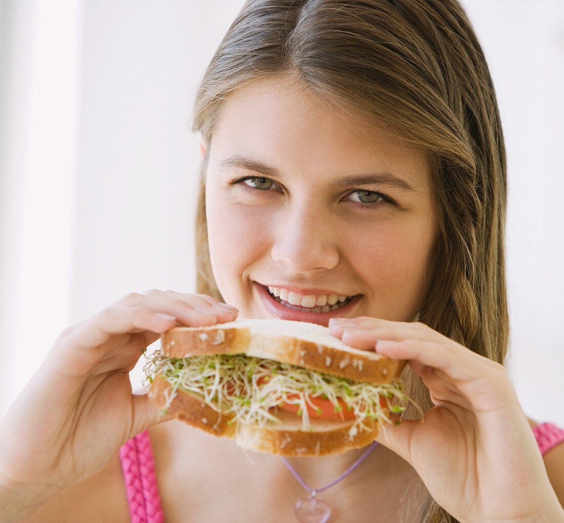 Girl eating sandwich