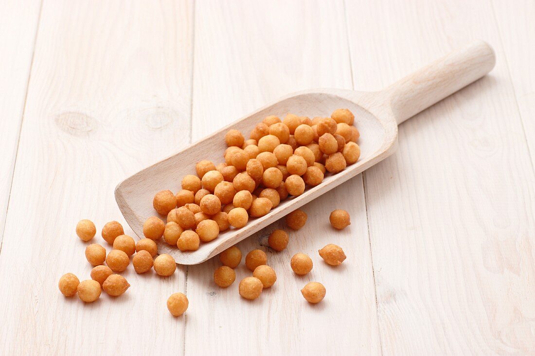 Soup pearls on a wooden scoop