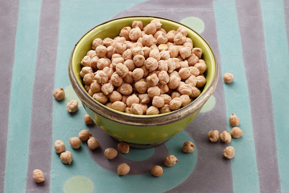 Chick peas in a bowl with a silver edge
