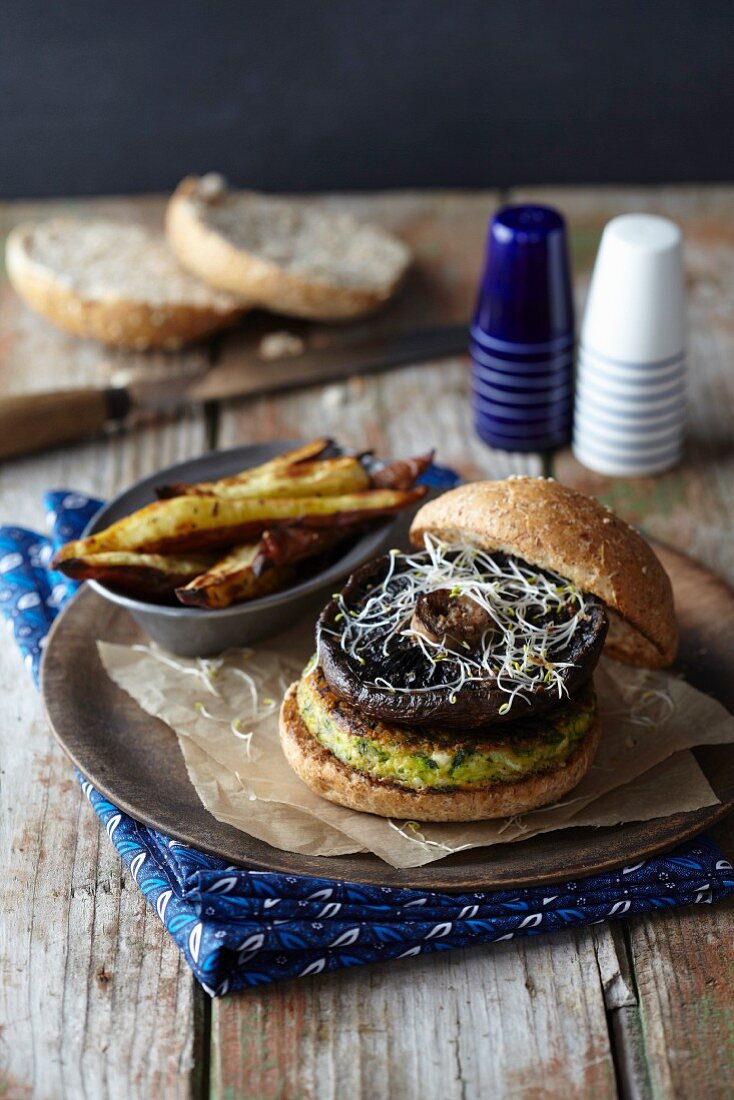 Vegetable burger with courgettes, mushrooms and sweet potato chips