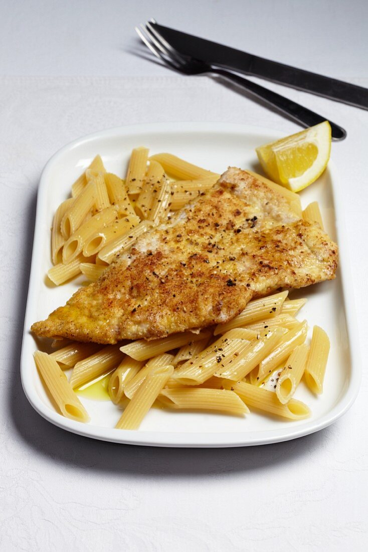 Breaded veal schnitzel with penne